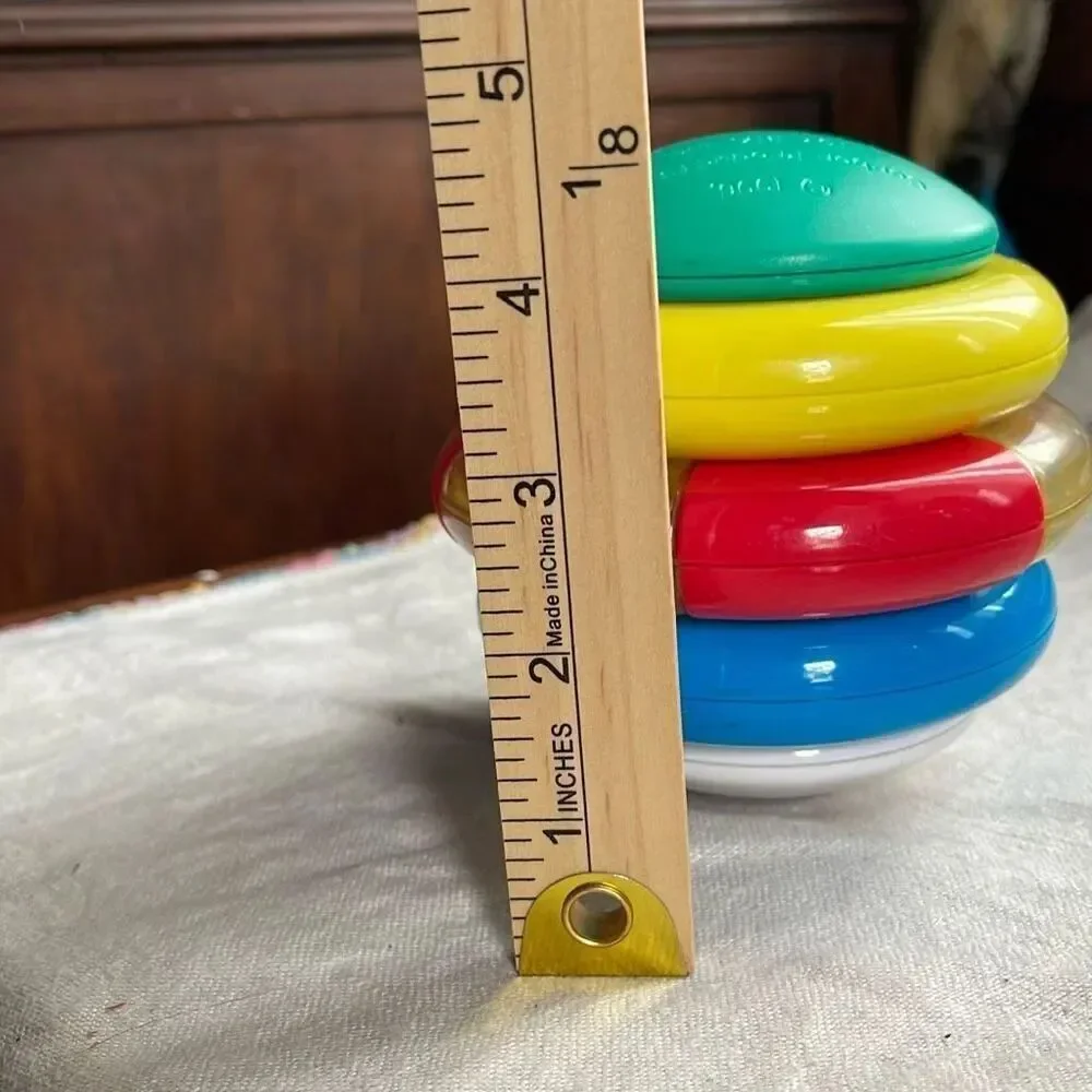 1996, Ring ‘n Roll Gerber Products Co. Toy Biz, Inc roundish rolling rattle infa